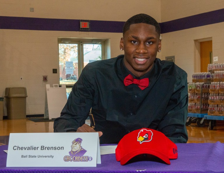 Basketball players sign NLI football letters